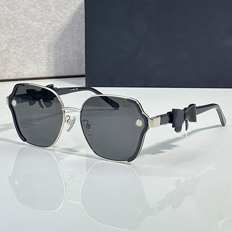 Ladies new rectangular Sun Glasses CH9187 With luxurious design bow shaped legs black lenses fashionable classic outdoor driving Sunglasses with box
