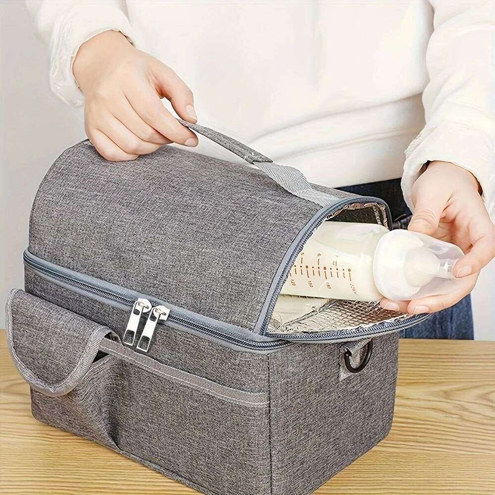 a portable insulated lunch box bag for carrying breast milk. One piece.