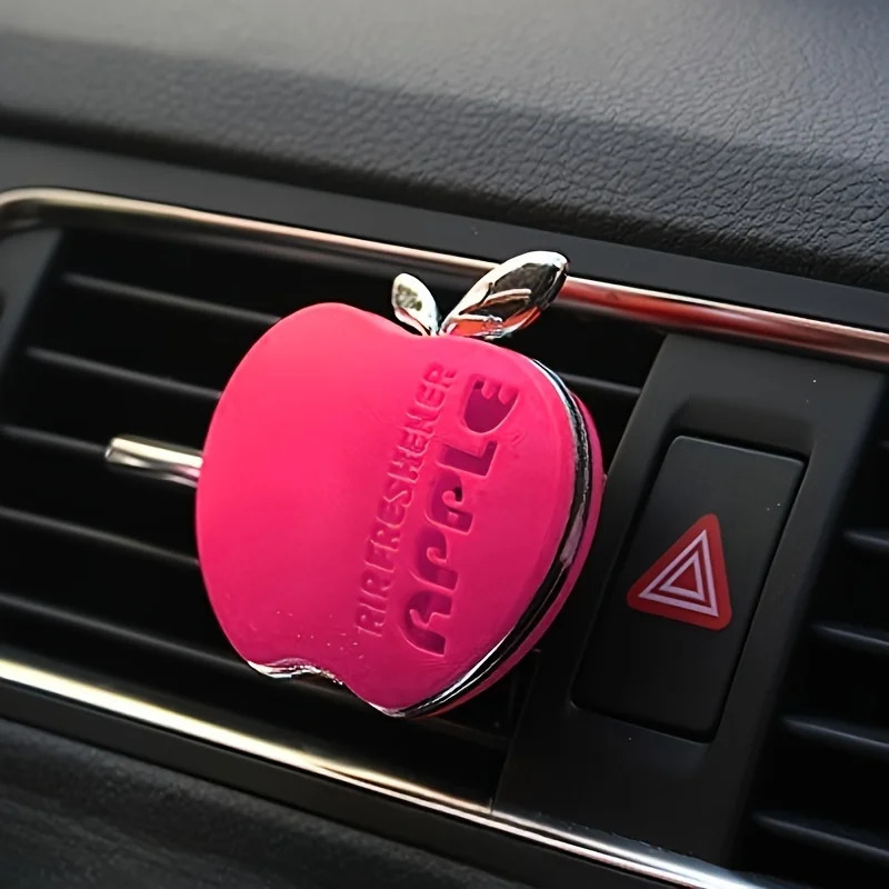 An apple-shaped car air freshener with floral fragrance - featuring a decorative ventilation clip n 260610