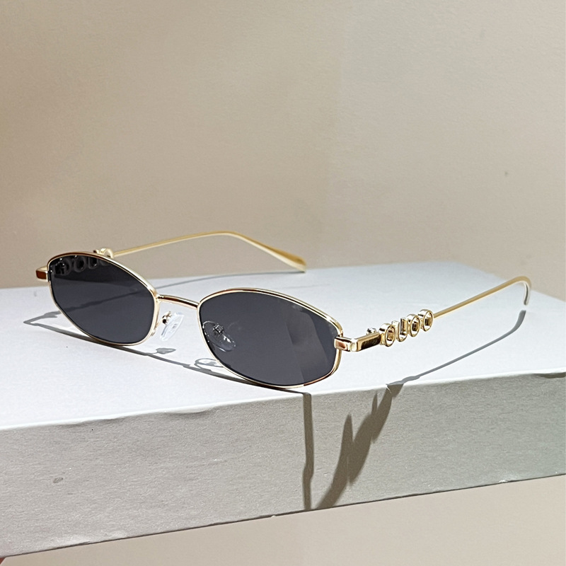 High quality 2026 New European and American Trendy Glasses Metal Oval Hollow Fashionable Retro Sunglasses for Women