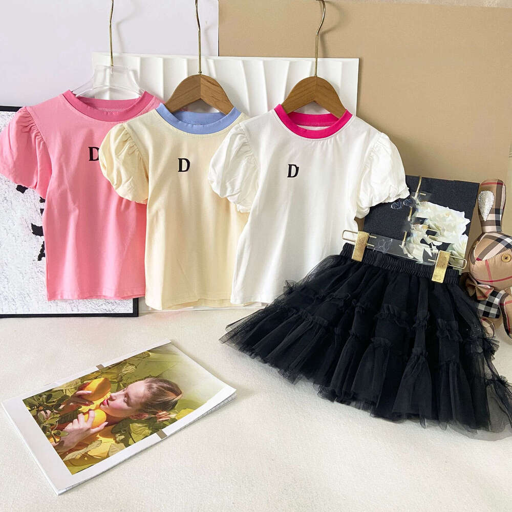 New 2026 Kids Clothing INS Summer New Style Girls Baby Lantern Sleeve Tshirt Mesh Puff Cake Skirt Twopiece Set Color Block Collar Correct Style