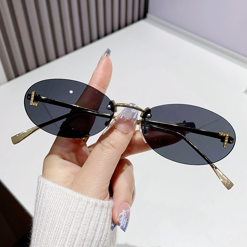 High quality New high-end European and American trendy small-frame decorative glasses, rimless with F diamond-embellished oval frame, fashionable su