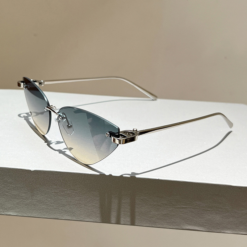 High quality New 2026 Frameless Triangular Sunglasses, High-End Trendy Personality Sunglasses for Women, UV Protection Glasses