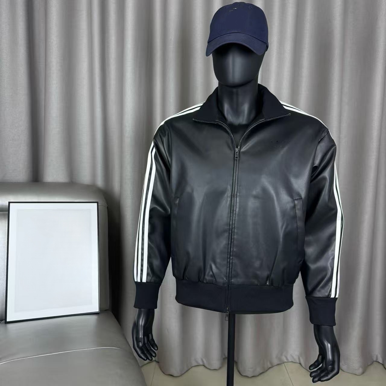 A trendy classic collar embroidered leather jacket with retro patch and chain zippers for motorcycle wear