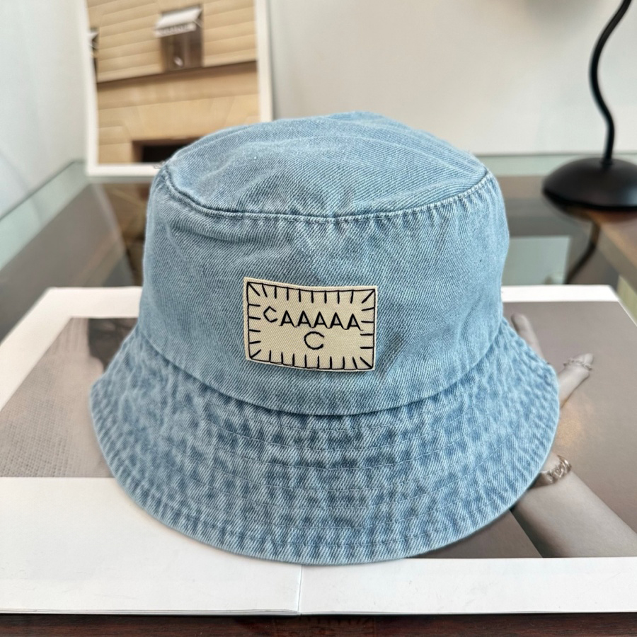 Chapeau de créateur Chapeau classique Matériau en denim Casquette seau Design à la mode Chapeau de pêcheur Classique Hommes et femmes Isolé Polyv