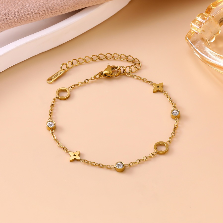 French-style light luxury diamond-embellished hollow four-leaf clover titanium steel bracelet for women-image-1110737116
