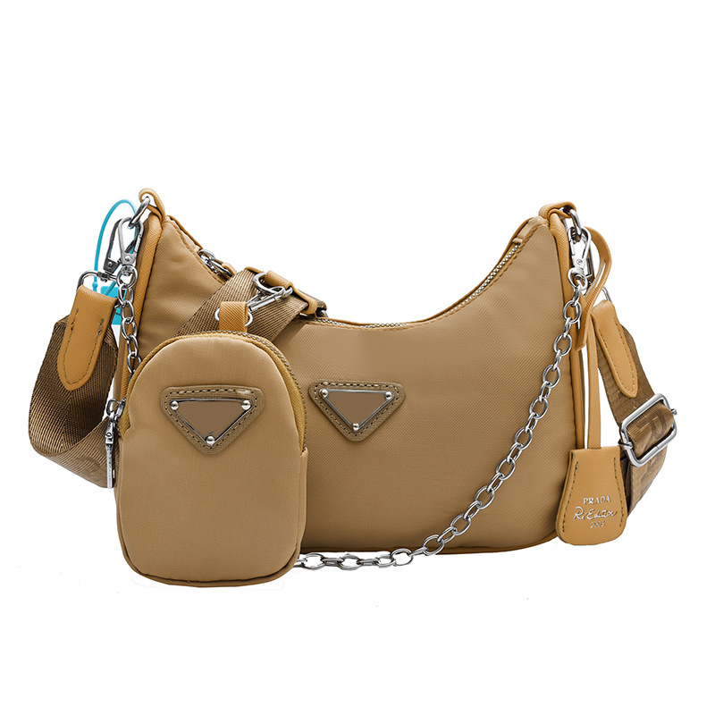 Designer bag 2026 classic embossed collision composite bag casual and fashionable versatile handbag for women black red pink green