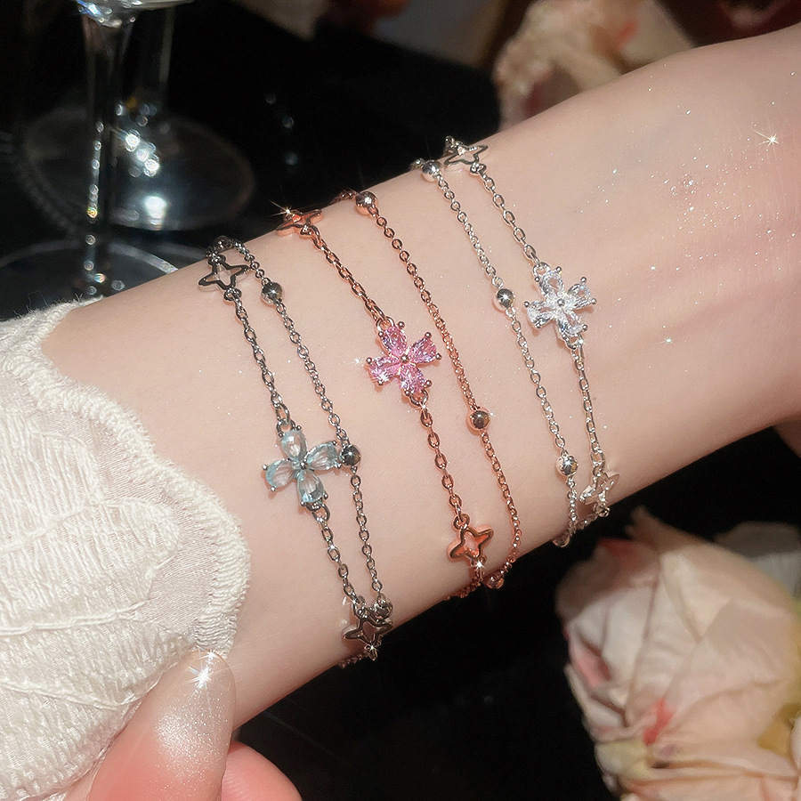 Korean-style double-layered four-leaf flower bracelet women, elegant, light luxury, high-end feel, versatile accessory for commuting-image-1111120778