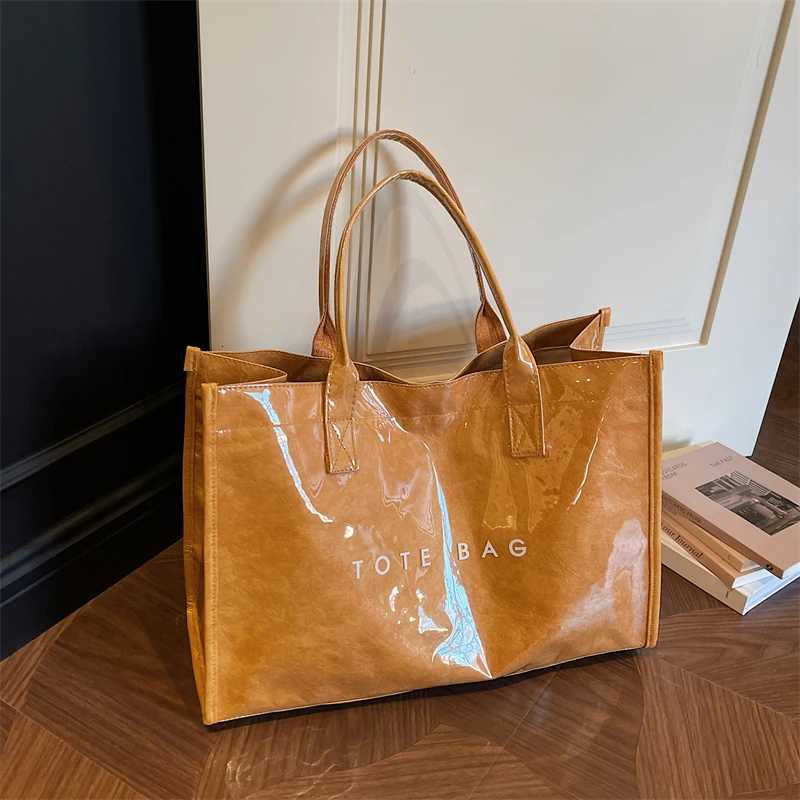 2026 New Womens Waterproof PVC Tote Transparent Jelly Handbag for Commute Beach Travel Durable Kraft Paper Style Shoulder Bag X260623