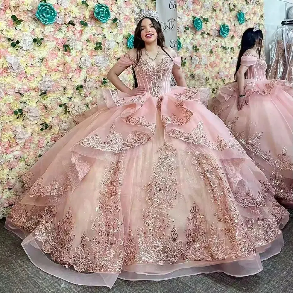 Rose gold fishtail corset big poofy dress with deep sweetheart neckline, heavily beaded lace, rhinestones, glitter tulle princess gown Quinceanera