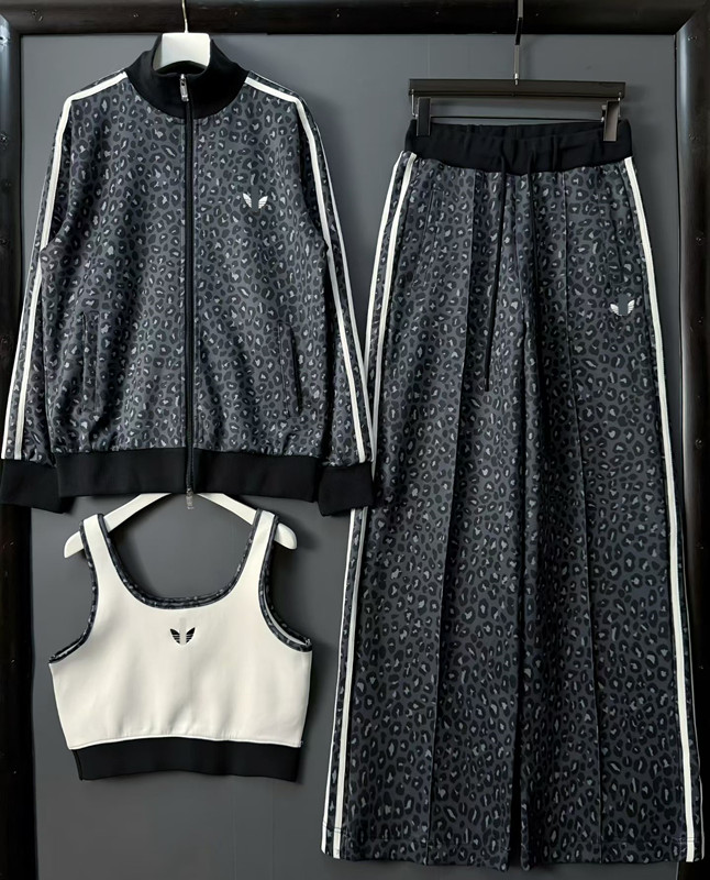 Felpa con cappuccio e pantaloni larghi da donna con colletto a tre foglie in puro cotone autunno-inverno del designer per abbigliamento casual e spo
