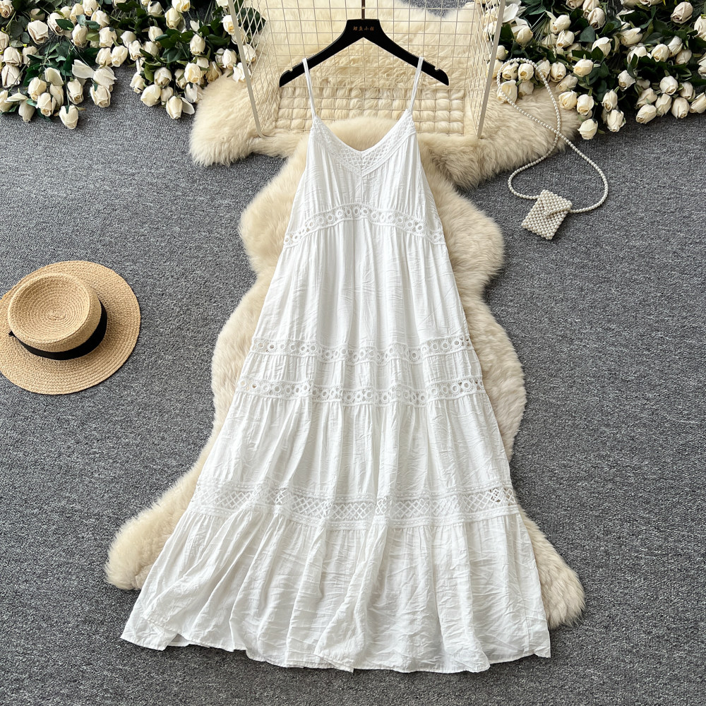 French holiday style white hollow embroidered suspender dress women's summer Korean version thin backless long dress