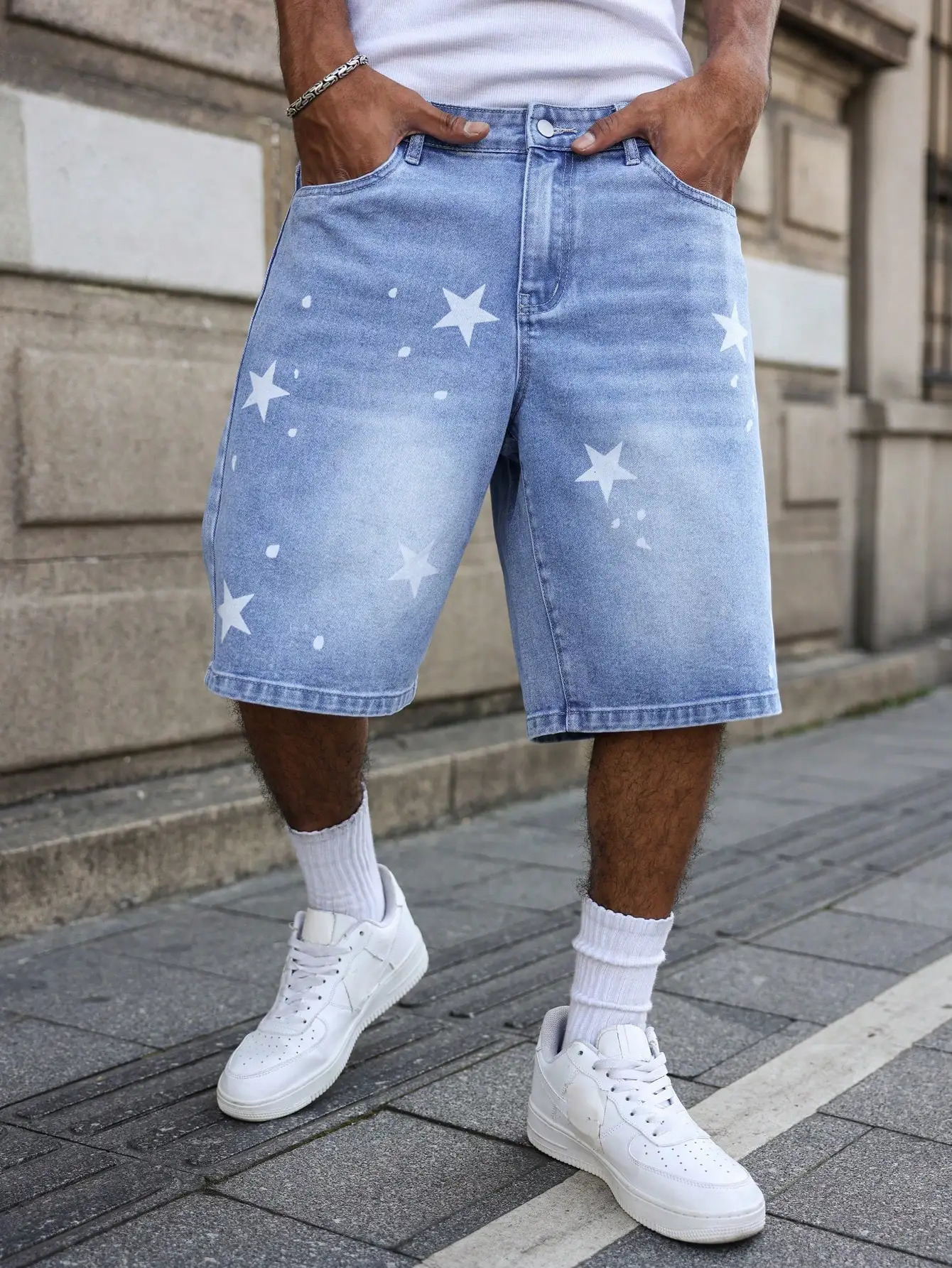 Mens blue denim shorts for spring and summer with stars printed on the legs are stylish and simple to match 260624