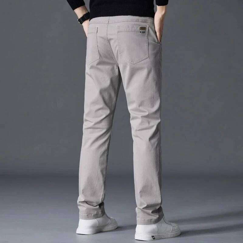 Pantaloni da lavoro casual tinta unita elastici dritti classici in cotone da uomo autunno moda pantaloni morbidi e comodi per abiti W260624