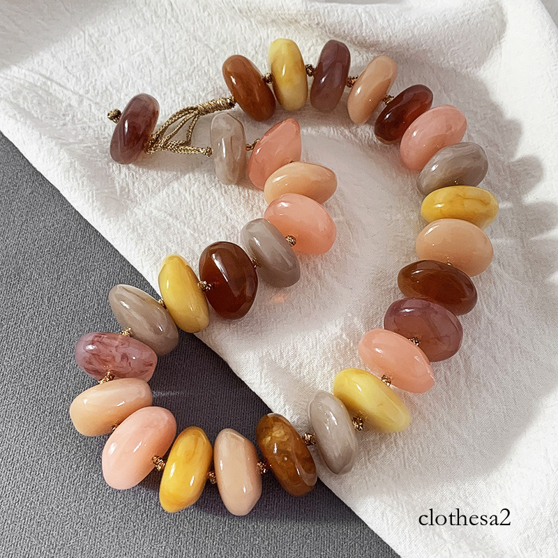 Vintage-style exaggerated colorful resin wheel bead necklace, irregular dopamine gold cord choker, wholesale