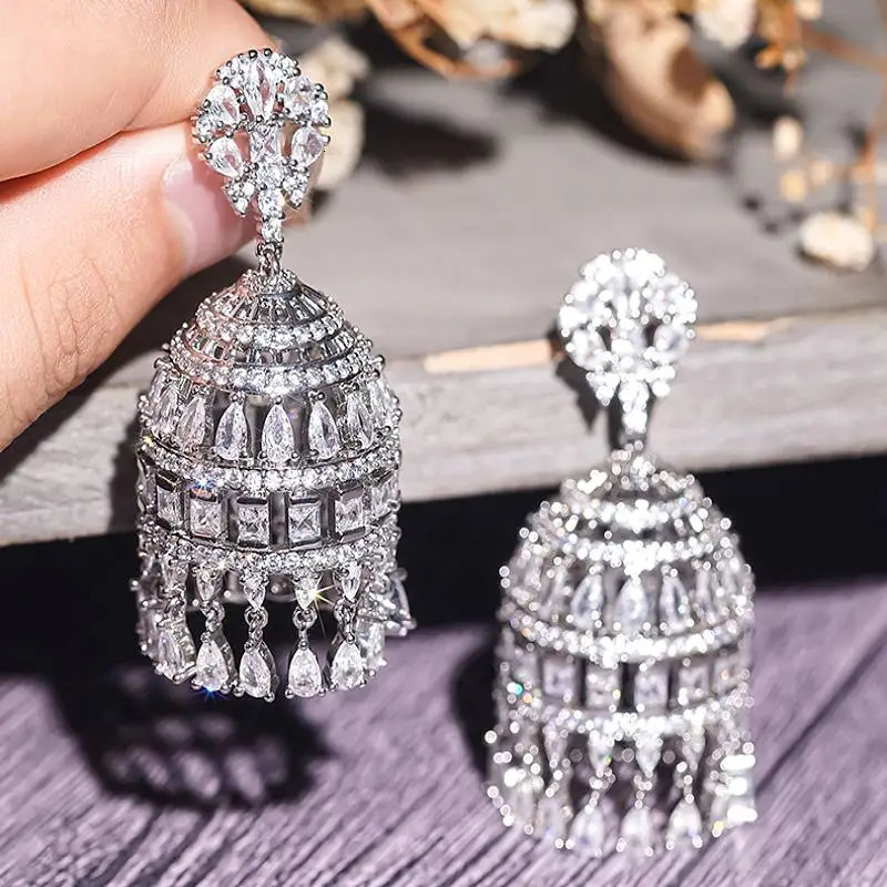 Huitan, pendientes colgantes de Color plateado para mujer, carillón para fiesta, accesorios de hipérbole diaria con incrustaciones de circonita bril
