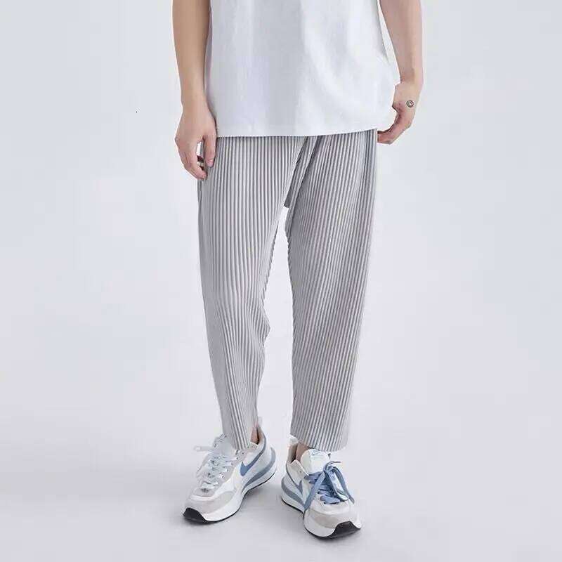 Pantaloni estivi a pieghe moda grigio nero casual da uomo streetwear giapponese pantaloni dritti larghi da uomo pantaloni in seta di ghiaccio W26062