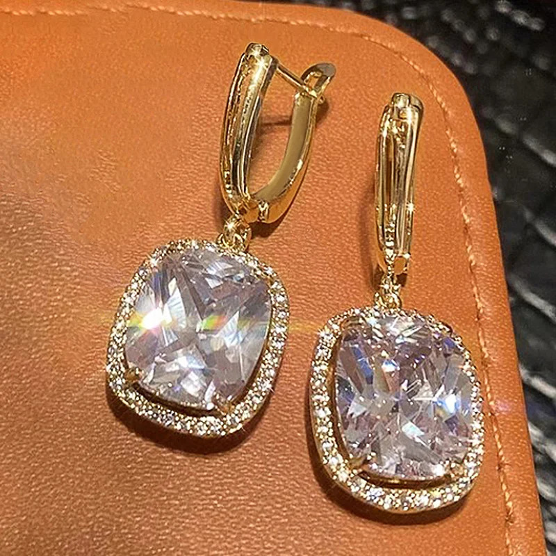 Huitan Pendientes colgantes de circonita cúbica grande de Color plateado delicado/Color dorado para mujer, accesorios de compromiso de boda, joyería