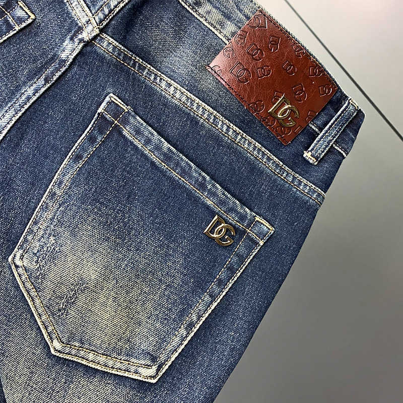Guangzhou Xintang jeans mens cotton elastic Korean version small foot slim fit high-end European quality mens thick pants L26624