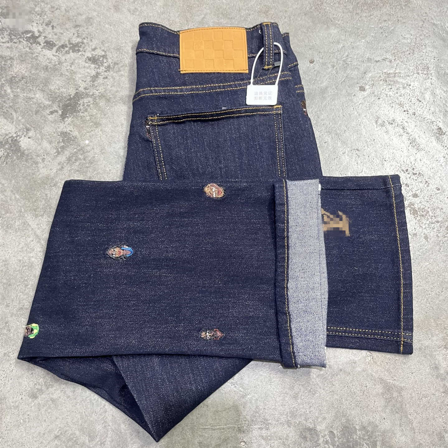 Guangzhou replica mens jeans spring Korean style high-quality European goods three-label embroidery slightly flared quick-selling L26624