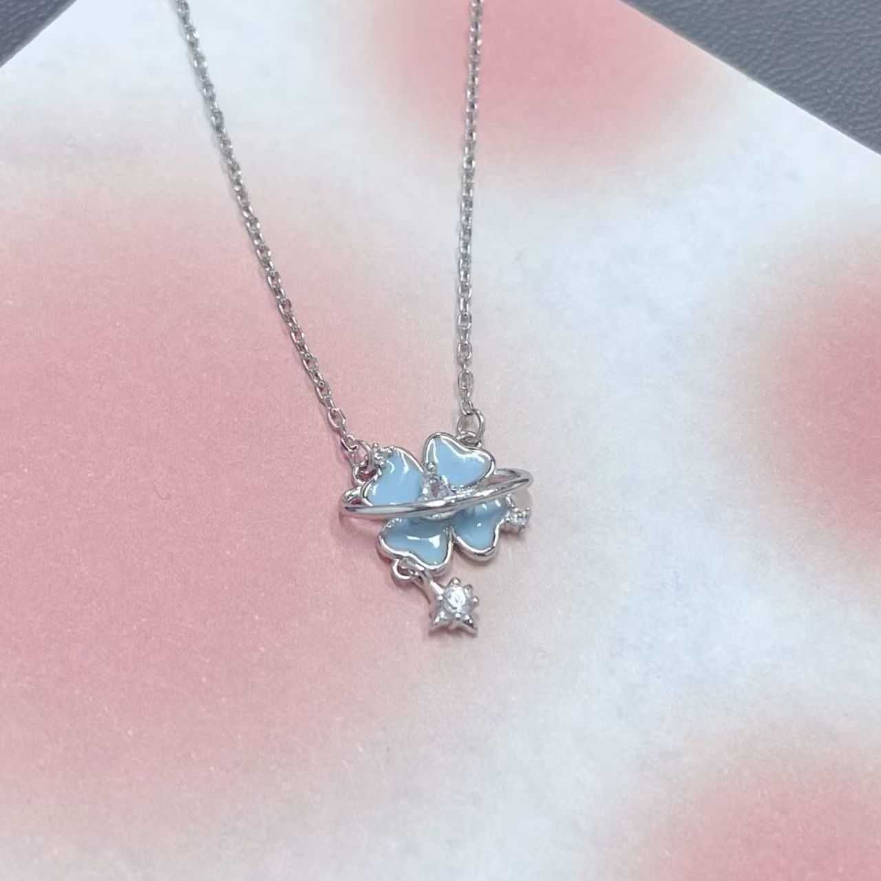 Blue Rotatable Clover Necklace for Women Silver Plated Four-Leaf Clover Butterfly Pendant with Sparkling CZ Star Elegant Luck Jewelry for Daily Wear
