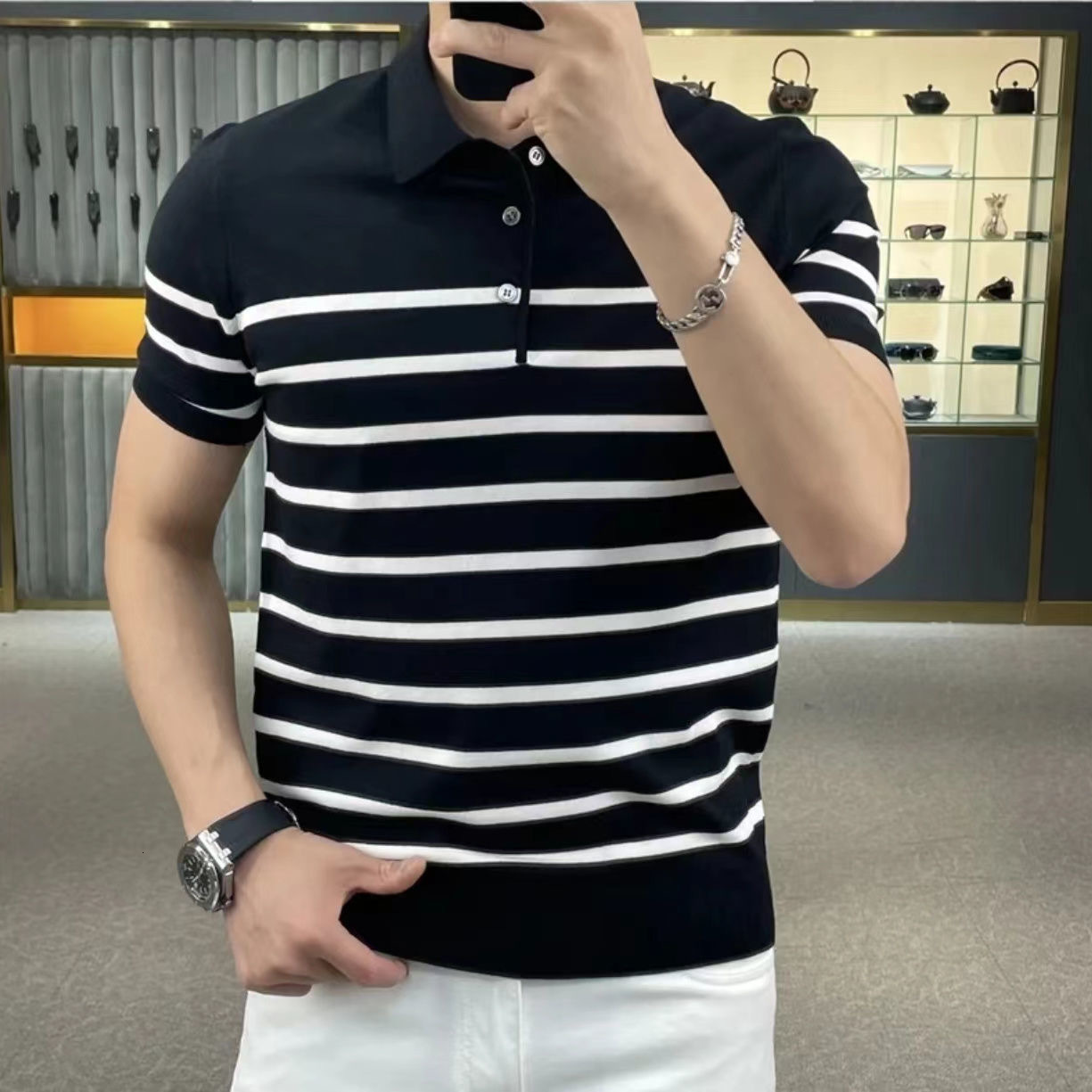 New summer knitted casual men's top with black and white striped color blocked short sleeved T-shirt, suitable for fashionable summer short sle