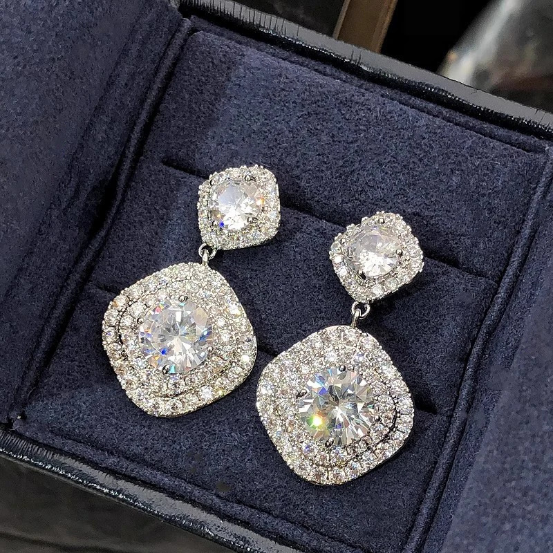 Huitan Pendientes colgantes de circonita cúbica brillante para mujer, pendientes elegantes de compromiso para boda, joyería de moda 260623