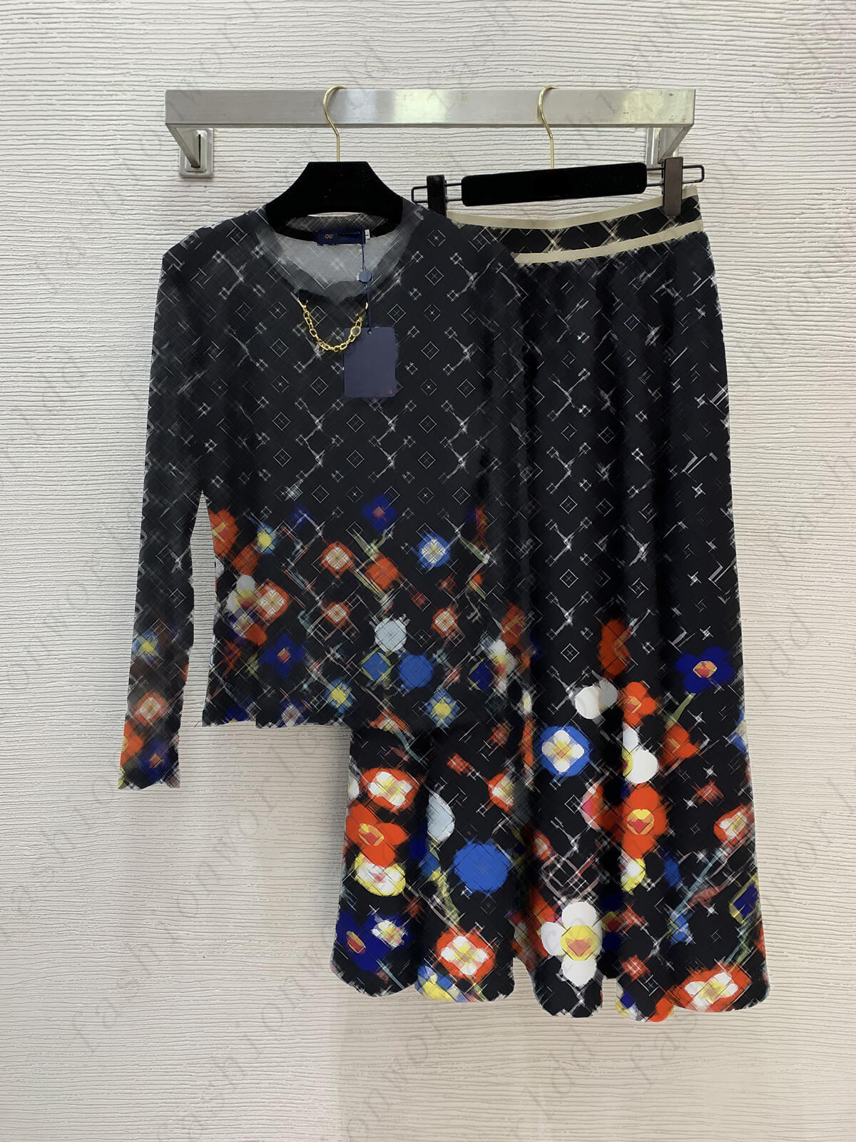 conjunto de falda para mujer marca verano 2 piezas conjunto de camisa con cuello redondo logotipo de moda camiseta de malla faldas de dos piezas dis