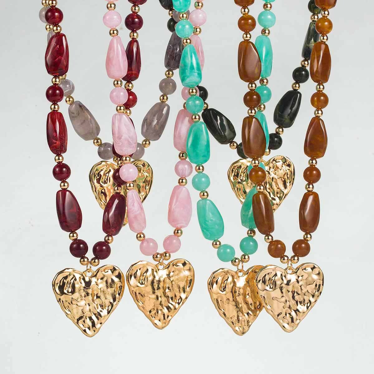 N12970 Unique retro-style geometric resin heart pendant necklace with elegant chain and beaded design