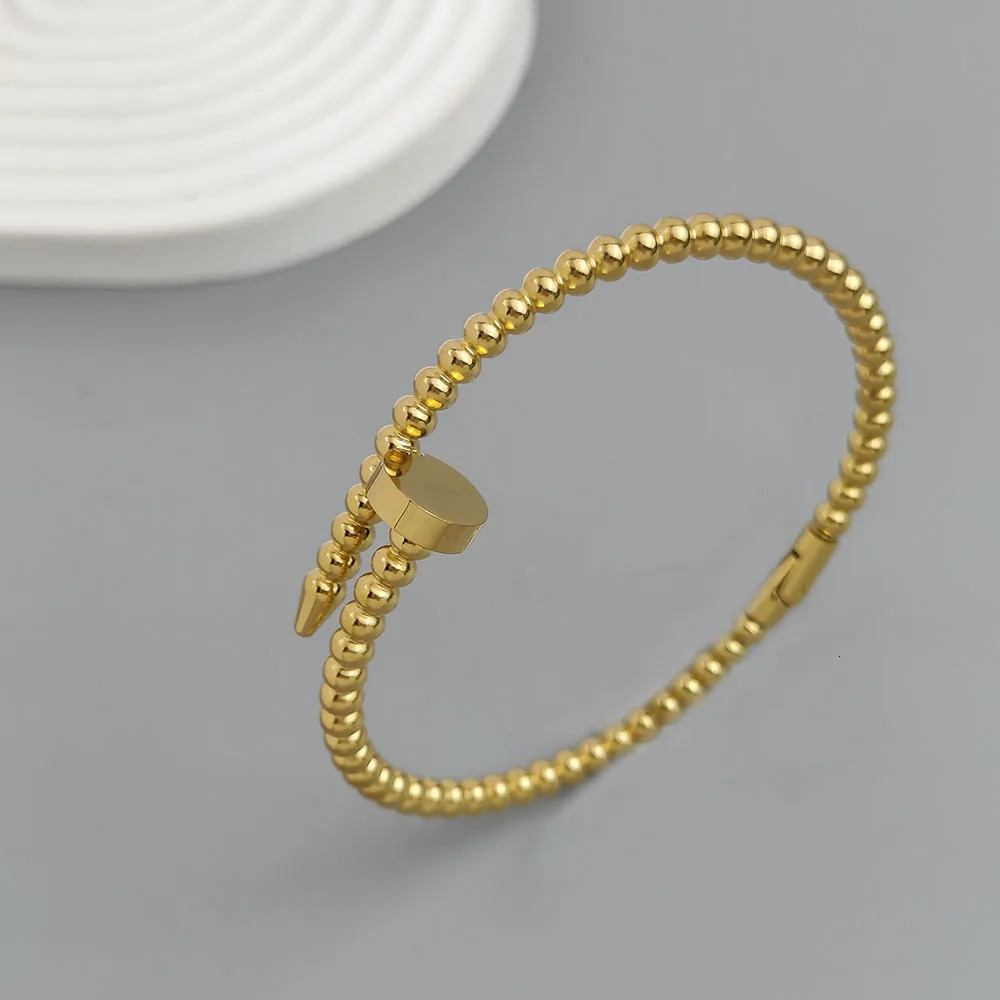 Simple nail shape round bead gold-plated stainless steel womens bracelet waterproof and rust-free bracelet worn by couples 260624