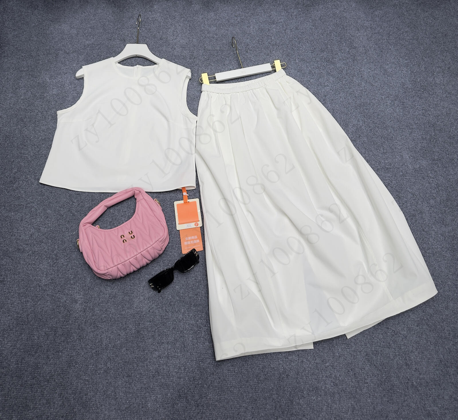women skirt set brand summer 2pcs sleeveless vest set fashion logo vest two-piece petal skirt vacation designer high waist skirt suit Jun 23 d1be