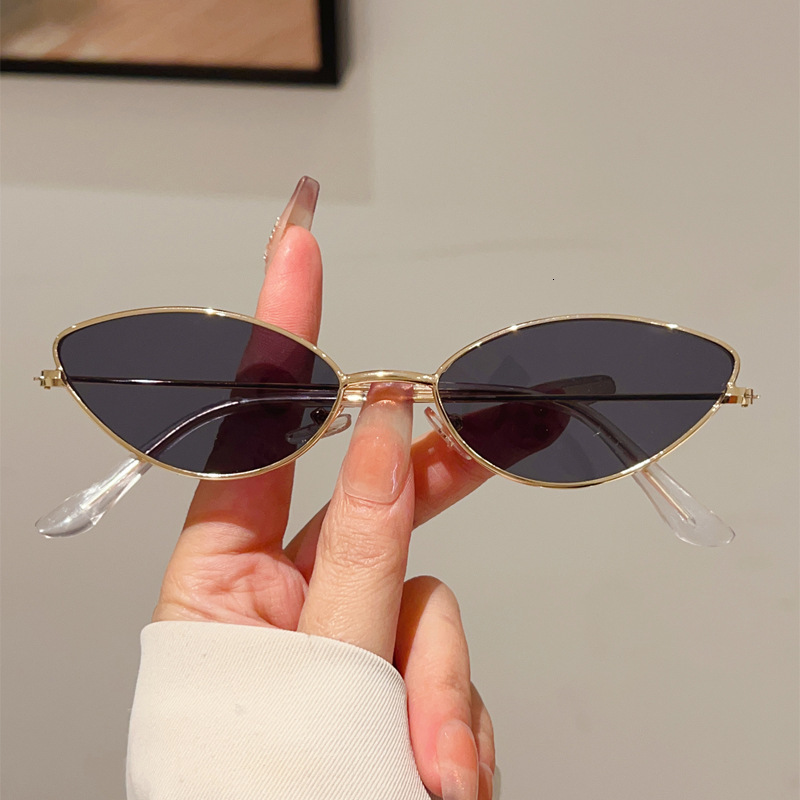 Luxury 2025 New Korean Cat Eye Small Frame Ocean Mirror Outdoor Sunglasses Fashion Sunglasses Metal Designer Sunglasses Street Shooting Sunglasses