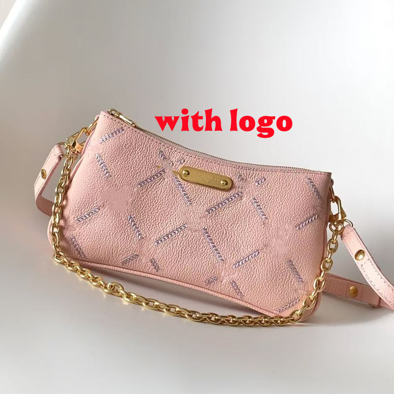 Hot Women's Pochette Liv M29495 Light Bliss Couture Cowhide leather Double zipper closure Central pocket highlights embossed embroidered detail