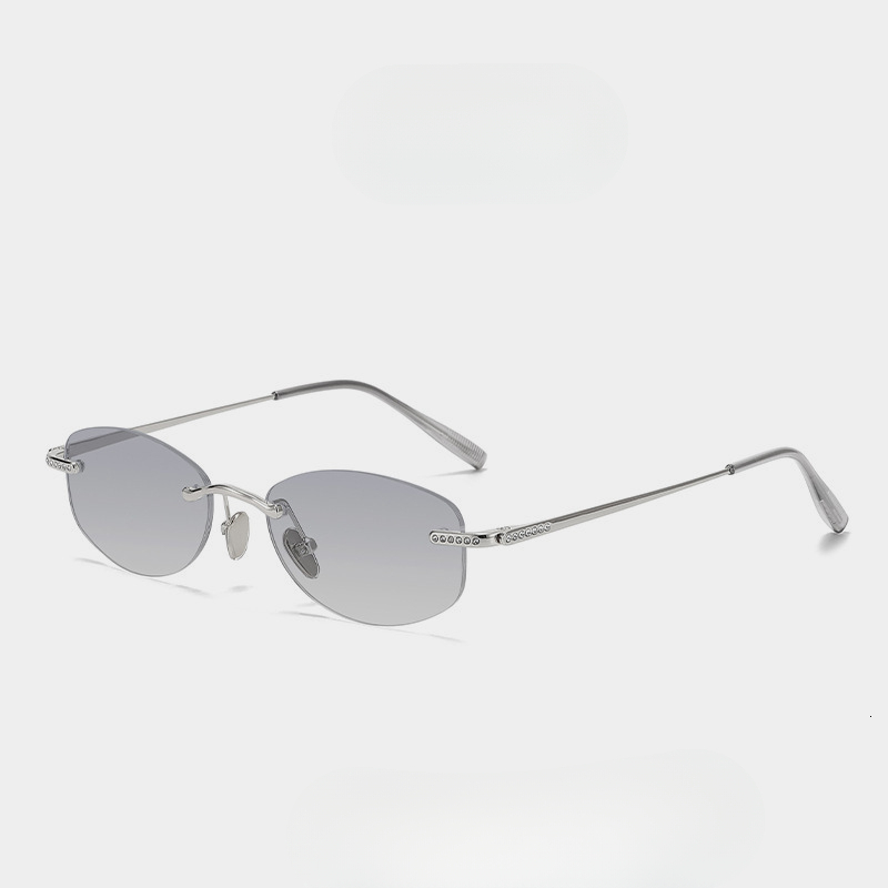 New Korean style metal oval frameless sunglasses for men and women high end fashion sun protection European and American cross border sunglasses