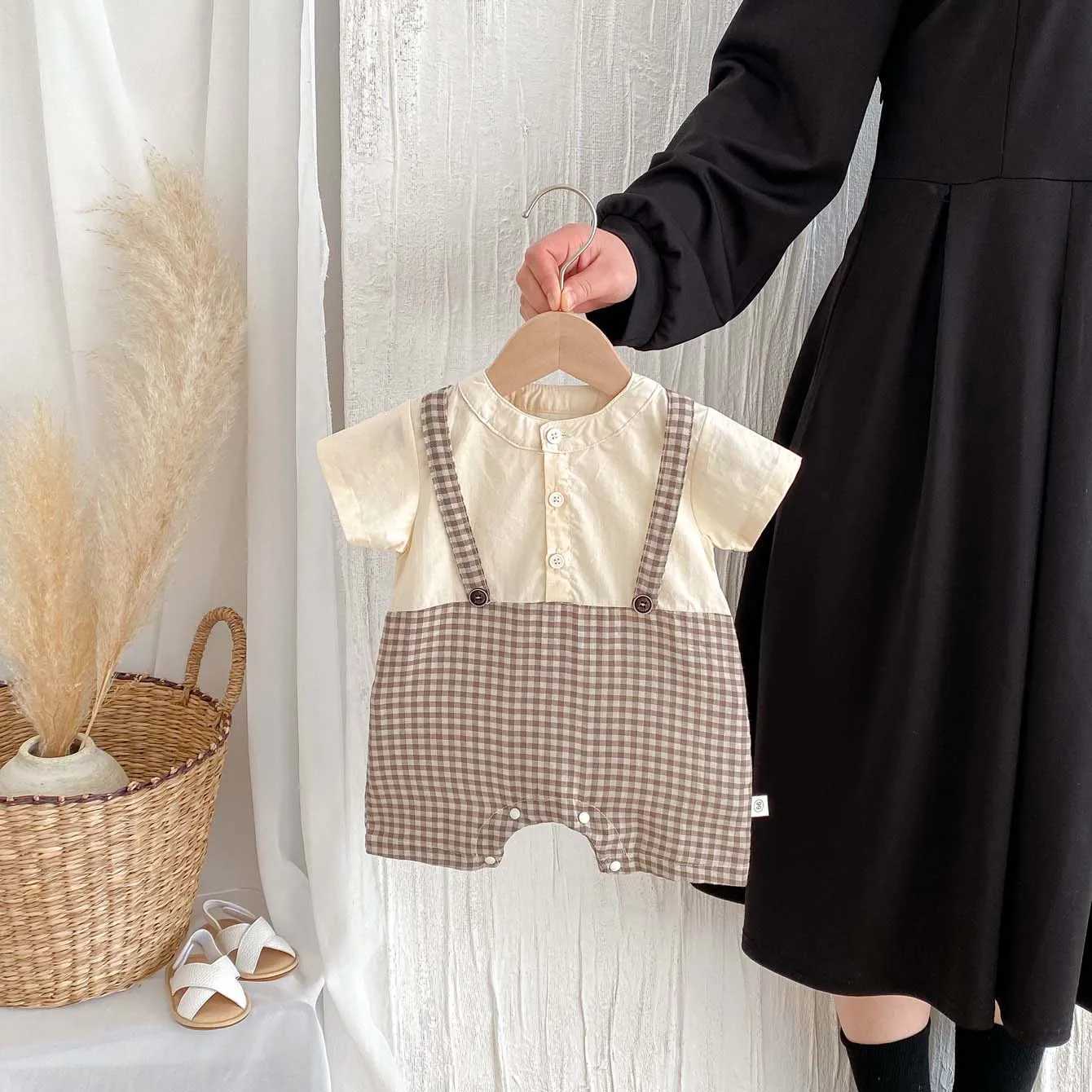 Korean-style baby fake two-piece plaid stitching short-sleeved jumpsuit summer baby boy fashion jumpsuit very suitable for goi Y260625ZD53