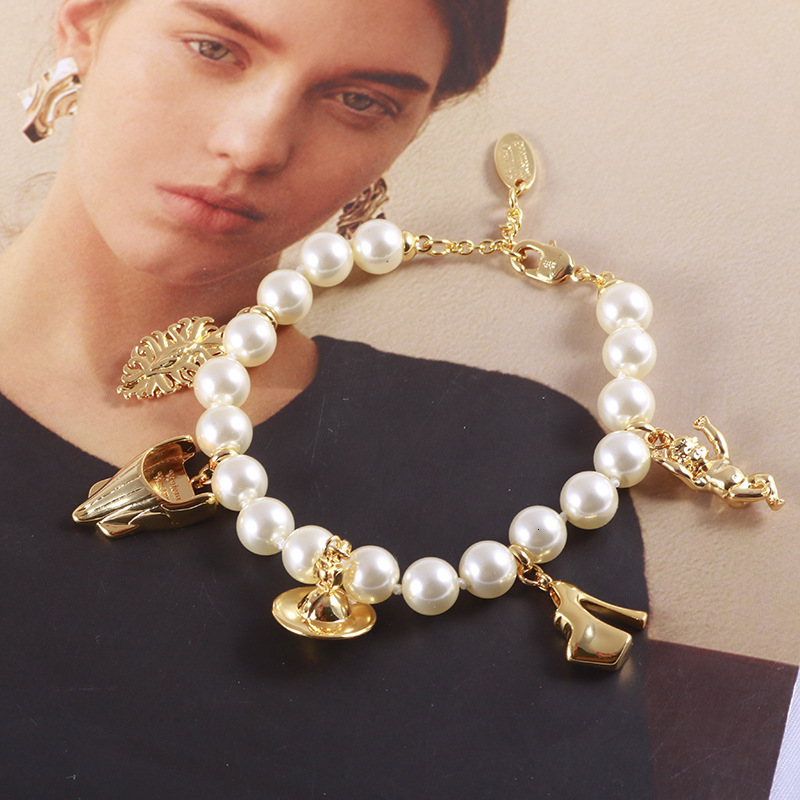 Saturn Jewelry Designer Vivienneewestwood Vivi Ennewestwood Luxury Bracelet For Woman Men Luxe Bangle Queen Mother Saturn Angel High Heels Pearl Bra