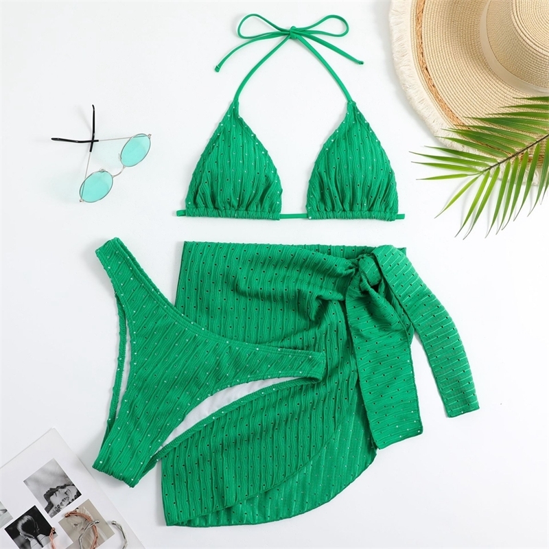 2025 Bikini con cuello halter de verano, traje de baño sexy con tanga de 3 piezas de material especial y falda pareo, ropa de playa blanca, negra, r