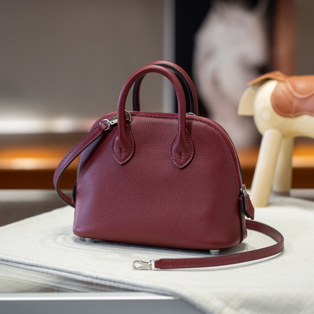 2026 new designer hot selling semi handmade wax wire steel hardware top cowhide bowling bag mini leather women's crossbody bag