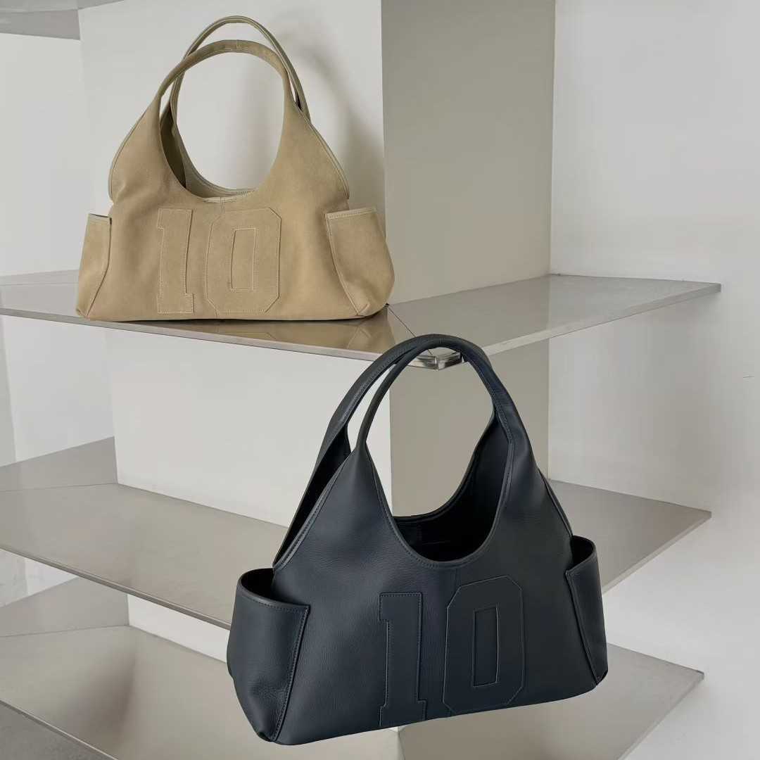 Niche design genuine leather tote bag 2025 new Korean style trendy travel luggage bag fashionable versatile commuter bag Q260626