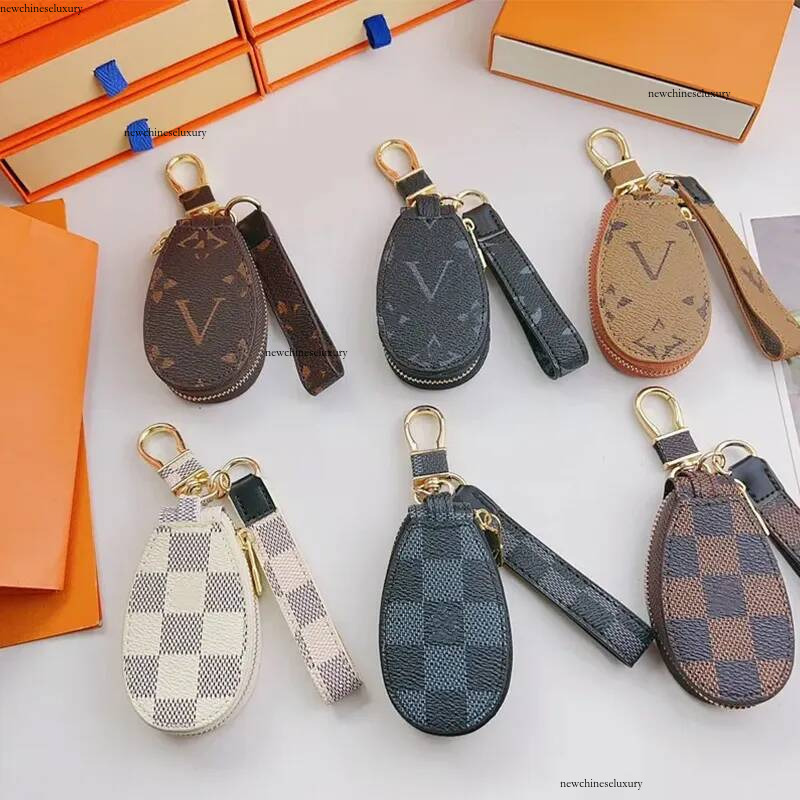 2023 Marque de luxe Satellite Charm Femmes Marron Plaid PU Cuir Or Métal Porte-clés Support Pendentif Design De Mode Sac Bijoux Cadeau