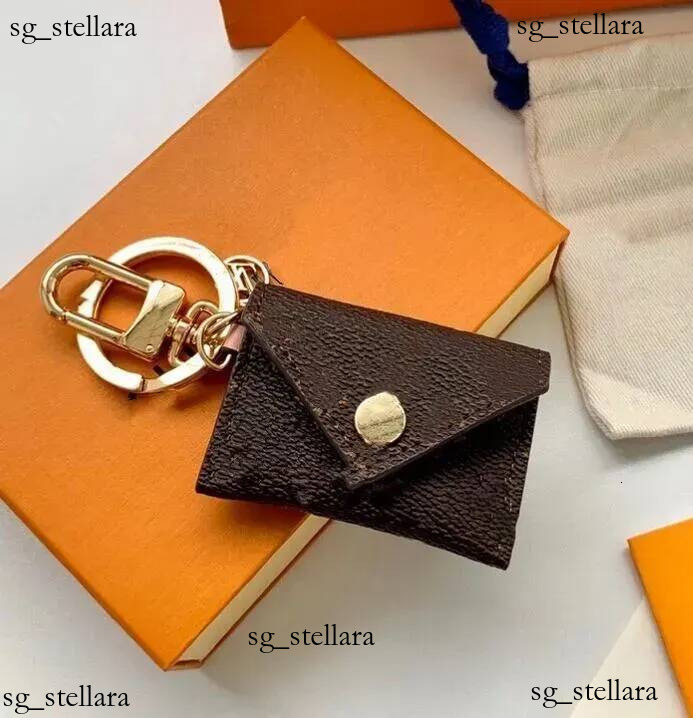 Sac de concepteur Charme Portefeuille Porte-clés Porte-clés Mode Bourse Pendentif Chaîne De Voiture Charme Fleur Brun Mini Sac Bibelot Cadeaux Ac