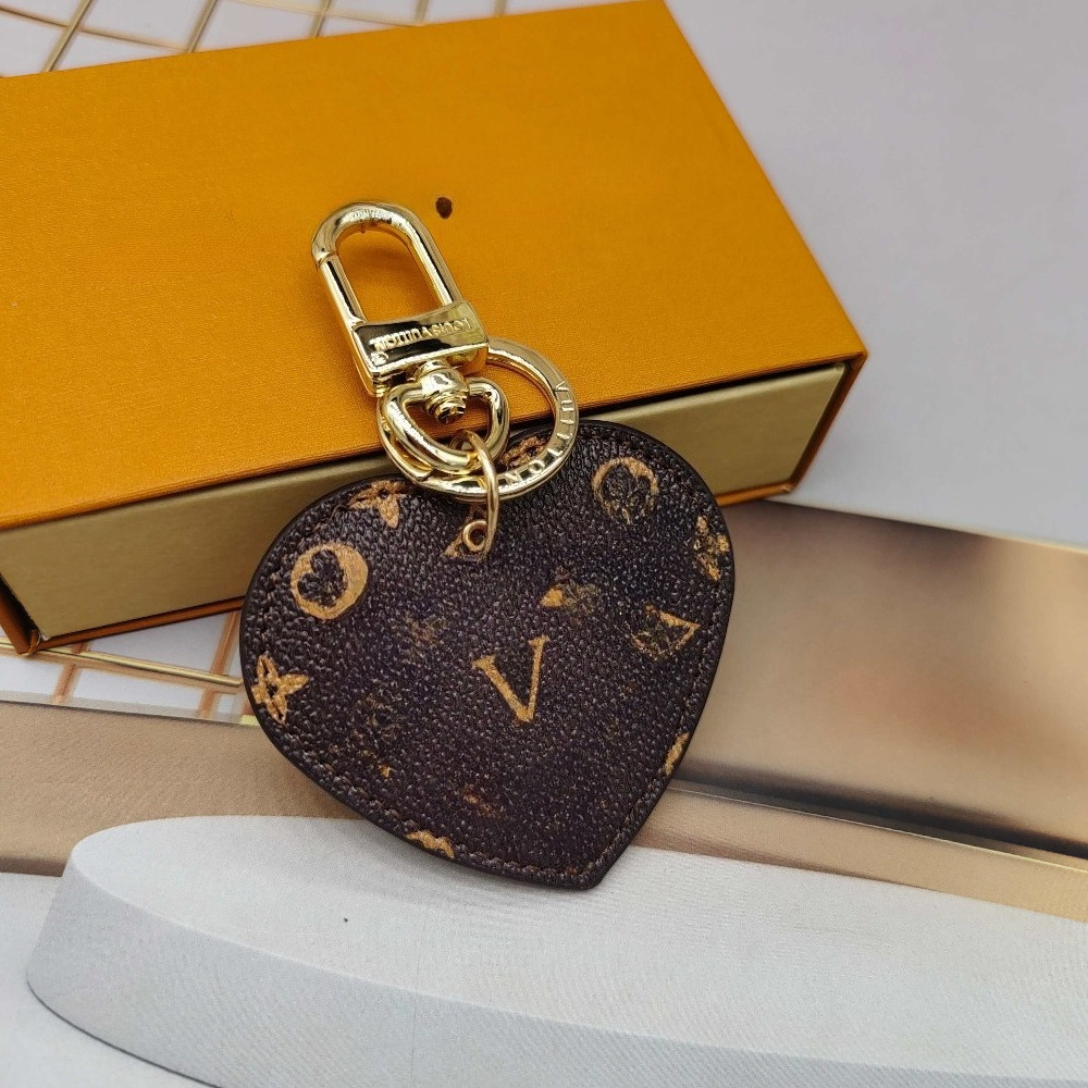 Porte-clés de luxe Designers Sacs Charms Accessoires Mode Femmes Porte-clés Longes Haute Qualité Bijoux Cadeau