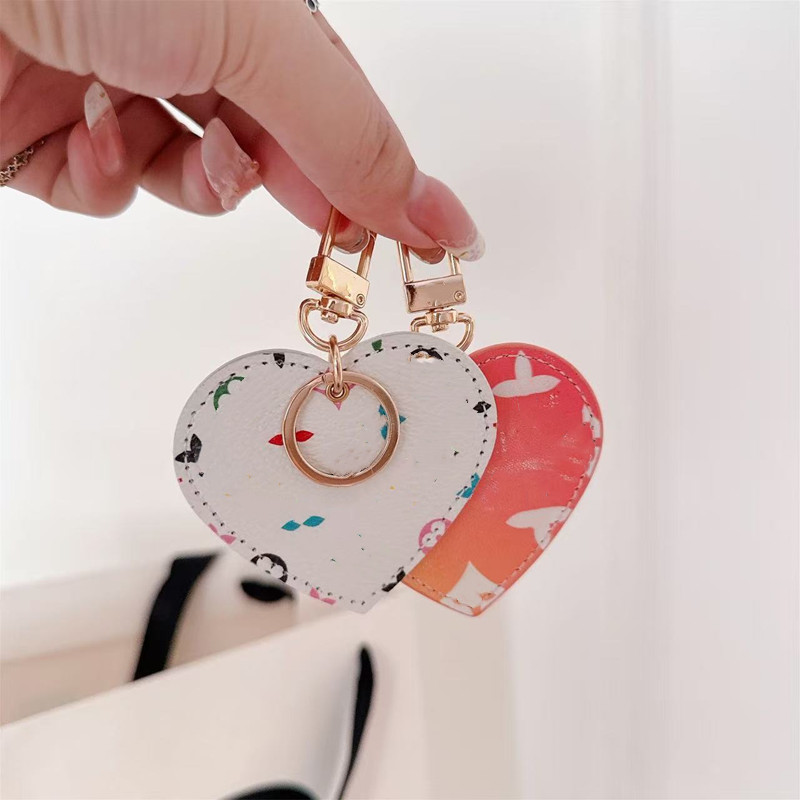 Porte-clés en cuir PU en forme de cœur de styliste, breloque de sac imprimée colorée, fermoir à homard en métal, pendentif de sac à main pour fem