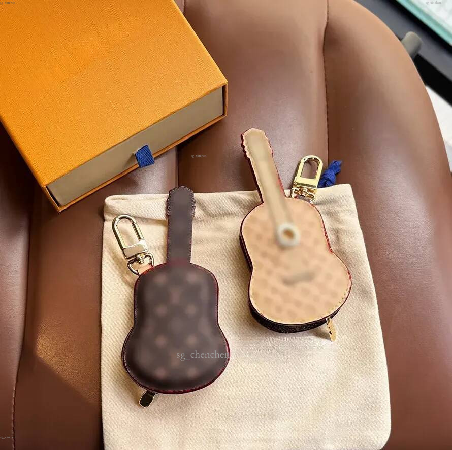 pochette de guitare fleur marron designer porte-clés sac charme porte-clés en cuir fait main homme femme mini portefeuille sacs pendentif porte-c