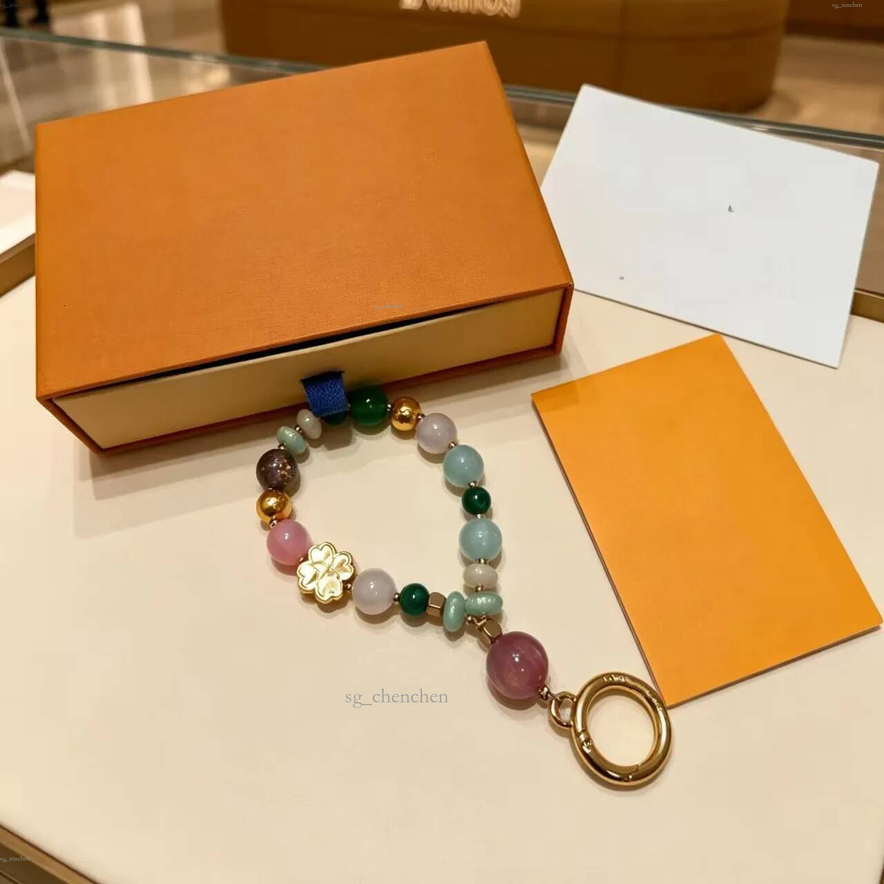 Avec boîte porte-clés perles de luxe porte-clés pendentif femmes lanières breloque pour sac porte-clés de luxe de haute qualité