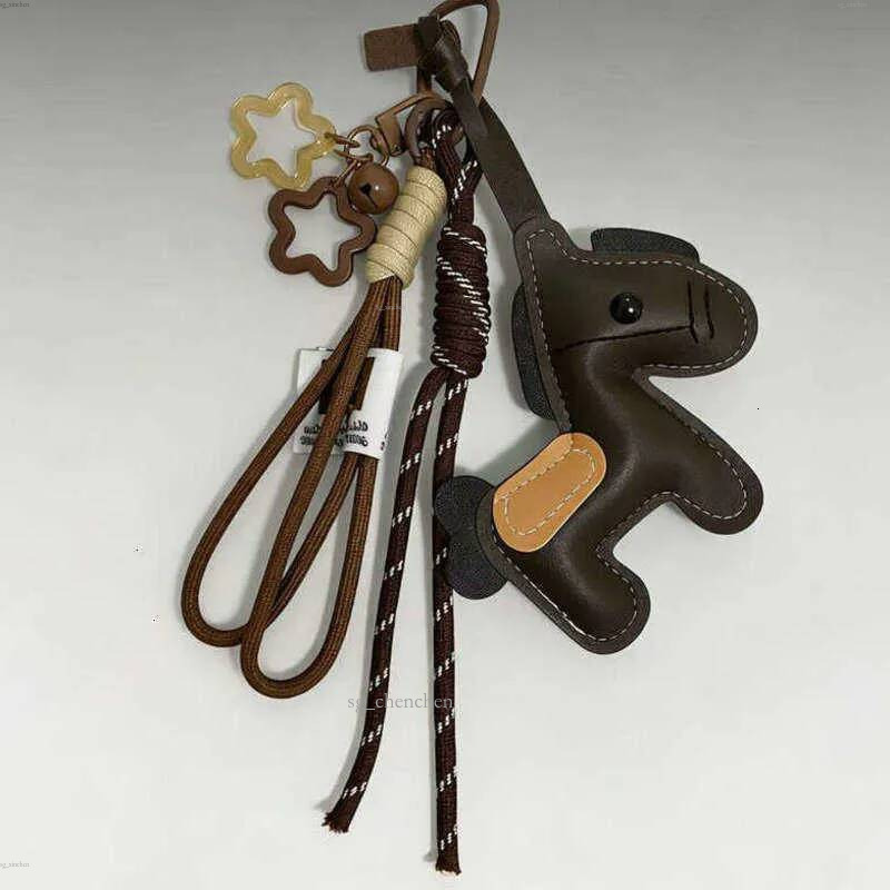 Charmes en cuir cheval porte-clés à breloques sac à main accessoire avec corde sac décoration cadeau pour les femmes S2609096HDW