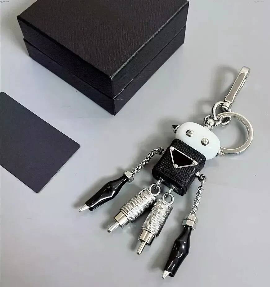 Designer Robot Saffiano Sac en cuir Porte-clés Personzed Robot en métal Pendentif Charme pour femmes Hommes Accessoires Porte-clés DHgate Z260317