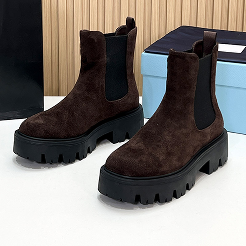 Famous Feminine Designer Stride Brushed Leather Booties Upper With Elasticized Side Gusset Pull Tab Back Thick Sole Boots Fashion Metropolis Street