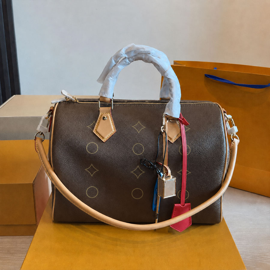 Sacs de mode Bagages classiques Sac de voyage fourre-tout Sac à bandoulière Sac à bandoulière Designer de luxe 30CM Housse d'oreiller en cuir dis