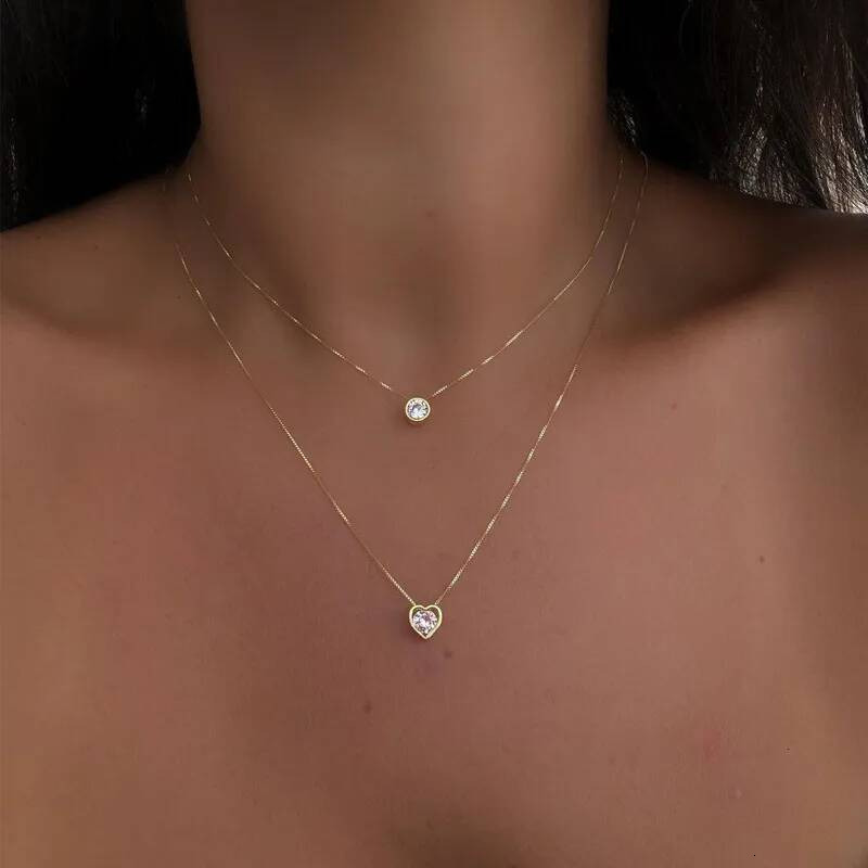 Collier en alliage en gros frontière européenne et américaine vente chaude mode multi couche coeur goutte d'eau pendentif Vintage chaîne de clavi